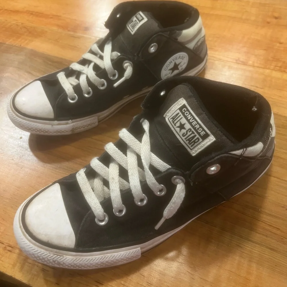Converse Black and White High-Top Sneakers with Iconic Design